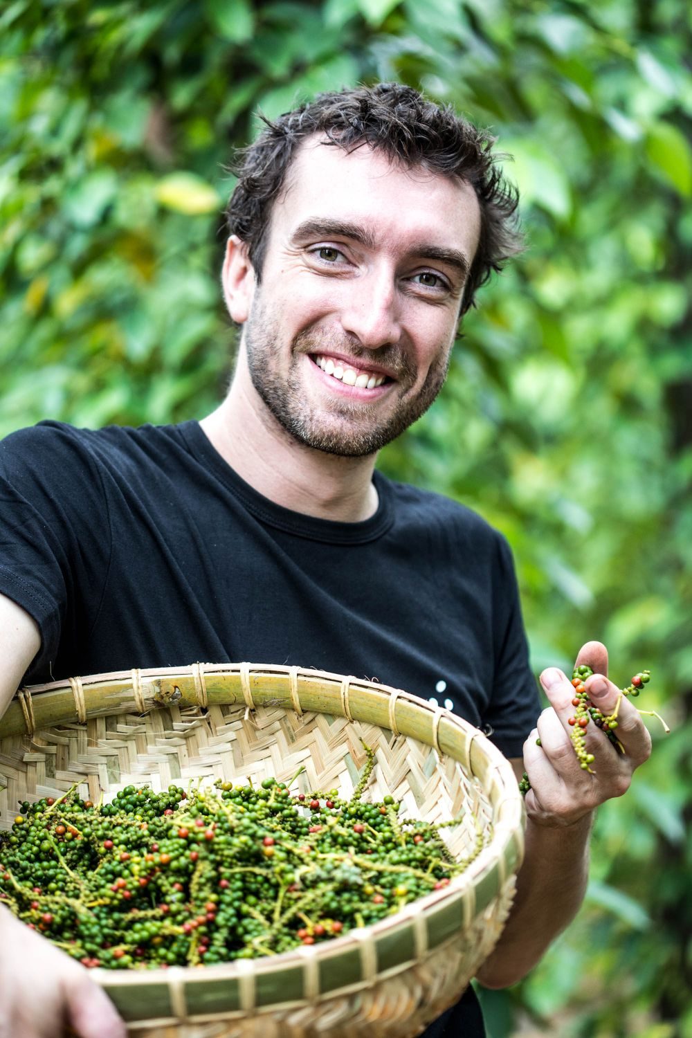 Norbert Binot, founder and chief executive, standing among the pepper vines
